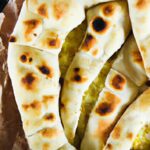Discover Turkish Pide: Authentic Flatbread with Savory Toppings